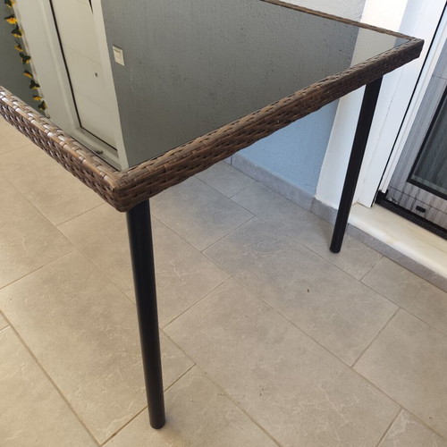 Balcony table rattan with glass surface like new