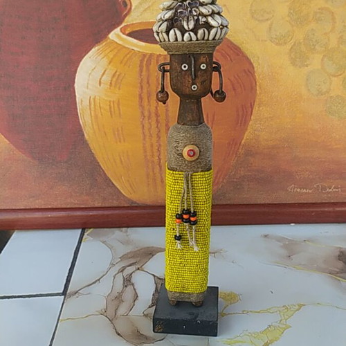 Namji African fertility doll handmade with wood, shells, cowrie, and yellow beads