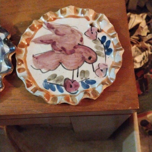 Ceramic plates like new with hand-painted traditional designs