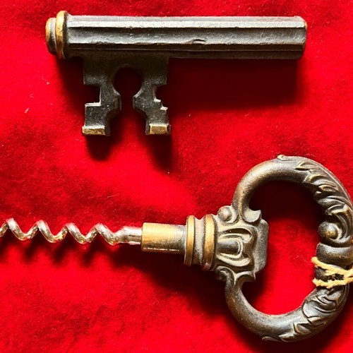 Vintage wine corkscrew and beer opener used, brass key shape 1960