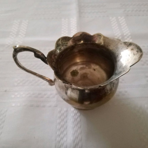 Silver-plated vintage Granny's milk jug used