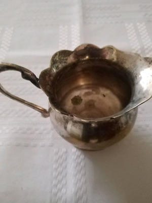 Silver-plated vintage Granny's milk jug used