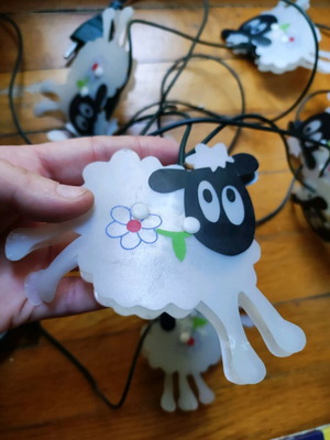 Decorative sheep string lights used, functional