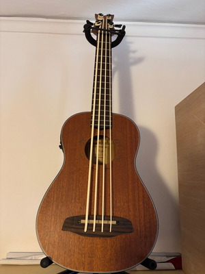 Ortega ukulele bass like new with gig bag and new Aquila strings