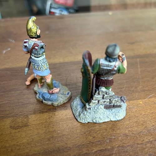 Soldier figures, one with detached arm
