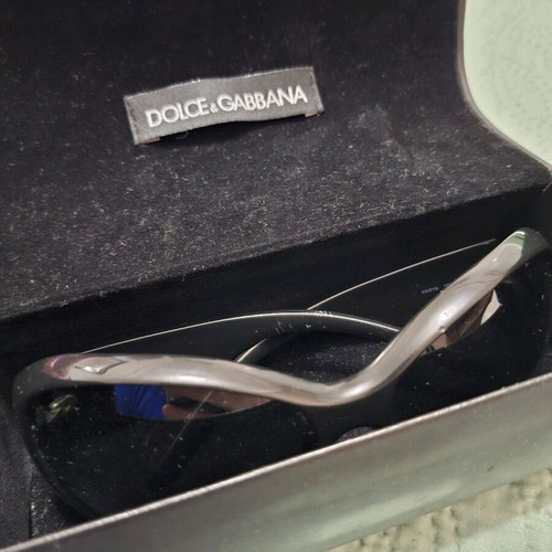 Dolce & Gabbana women's sunglasses used, oval black frame