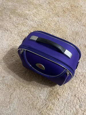 Cosmetic case used, missing long strap