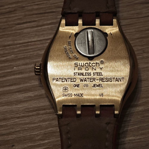 Swatch wristwatch women's used with camel strap and gold details