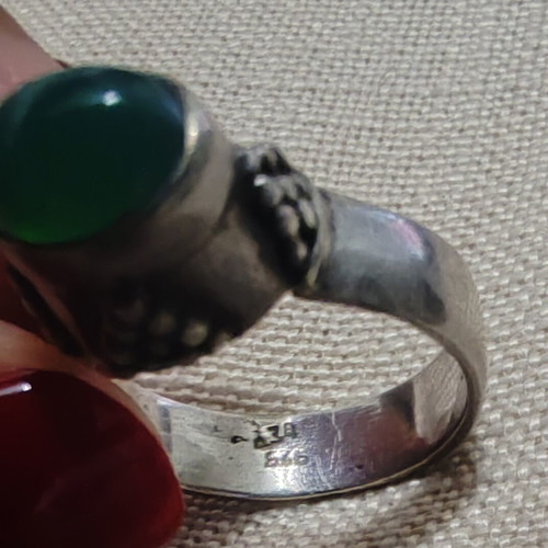 Silver ring with green stone used