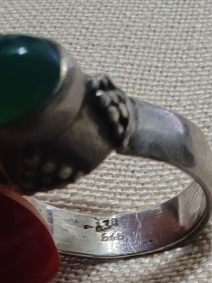 Silver ring with green stone used