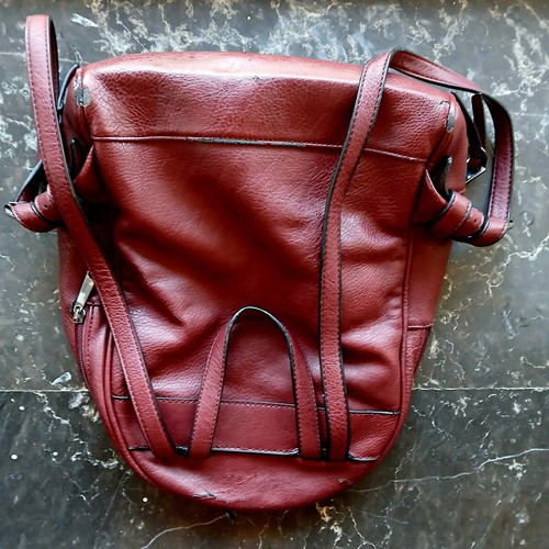 Women's burgundy backpack bag used