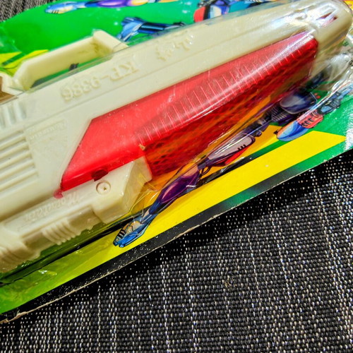 Vintage Space Laser Gun new, sealed in blister pack