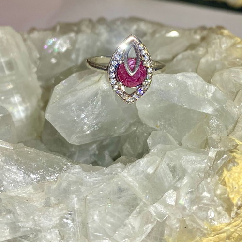 Silver ring with natural ruby and moissanite