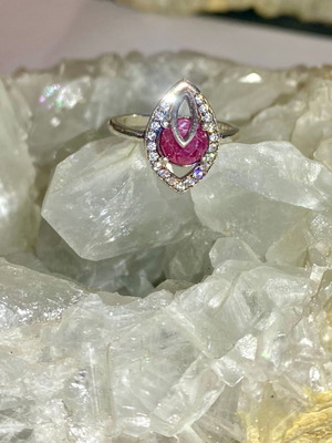 Silver ring with natural ruby and moissanite