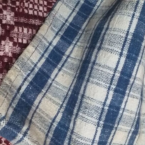 Old warp-weighted loom pillow used, very old with wear