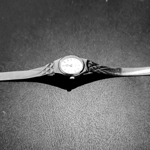 Lorus vintage women's quartz watch with embossed silver bracelet