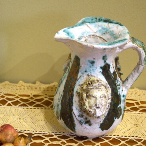 Decorative vintage jug used with mascarons