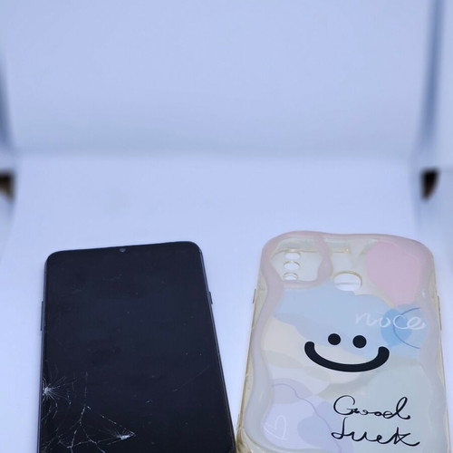 Samsung Galaxy M20 used for parts with case