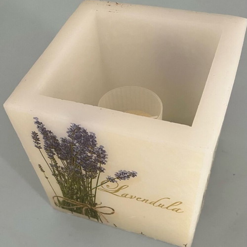 Decorative candle in wax pot new