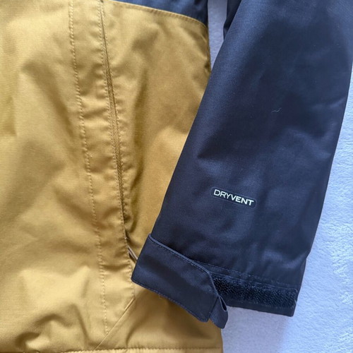 The North Face Millerton jacket like new, windproof, waterproof, black and gold