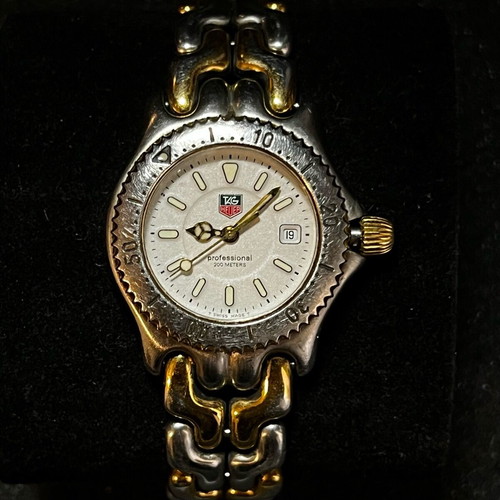TAG Heuer watches used, gold and silver colors