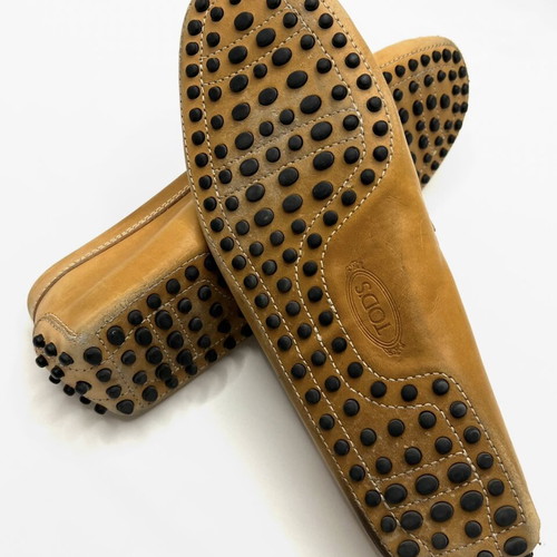 Tod's beige leather gommino flats used