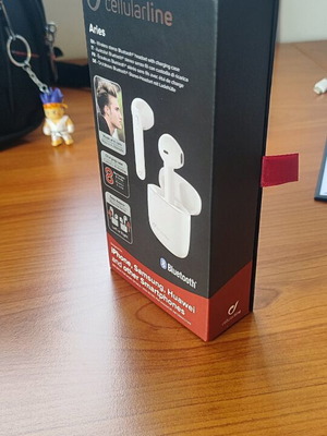 CellularLine Bluetooth earbuds used, white, wireless