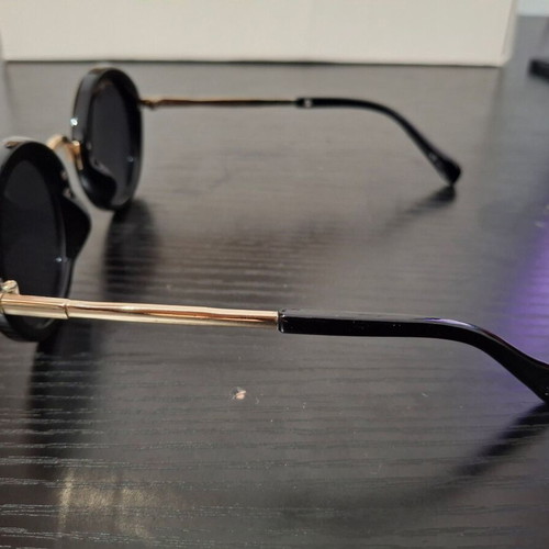 Women's sunglasses used with case and cleaning cloth, black and gold