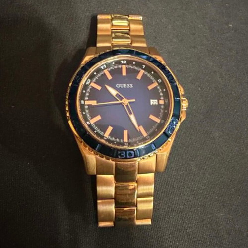 Guess W0469L2 watch used, stainless steel rose gold, blue dial 36mm