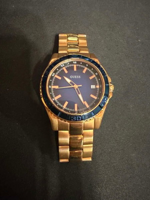 Guess W0469L2 watch used, stainless steel rose gold, blue dial 36mm