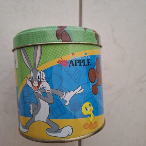 Apple round metal storage tin with Looney Tunes '00, like new
