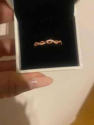 Twisted ring with rhinestones new, pink gold Al'Oro