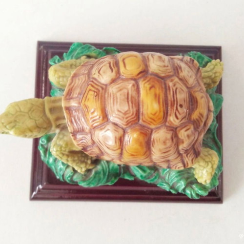 Decorative turtle on wooden base like new