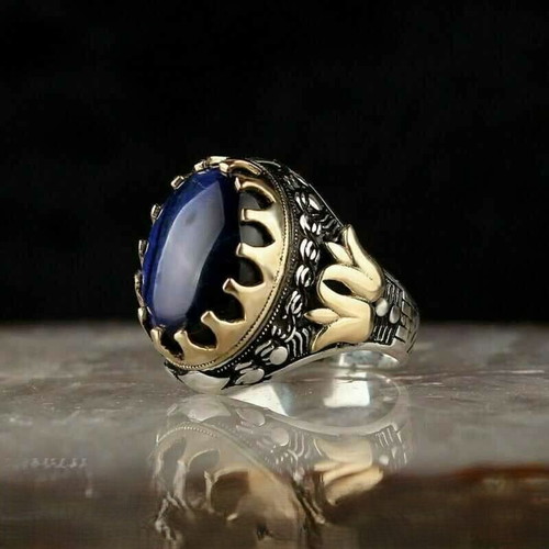 Women's ring new with blue topaz and rhodium plating