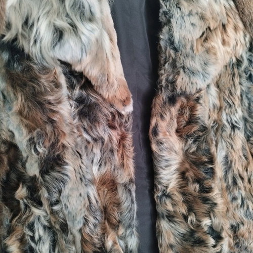 Diversi natural fur size 38 like new
