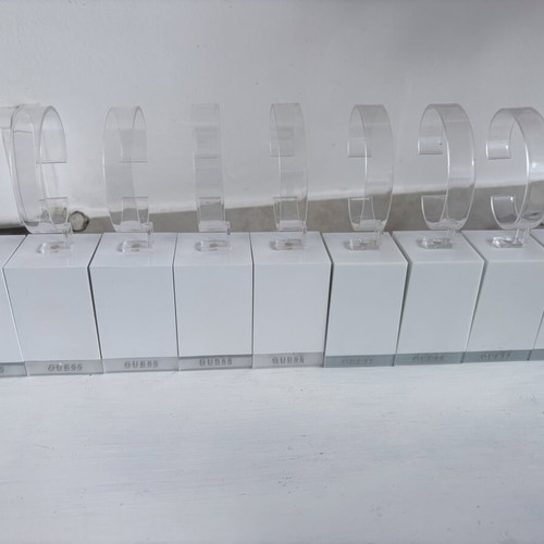Guess 26 bases for bracelets or watches, like new, display stands set