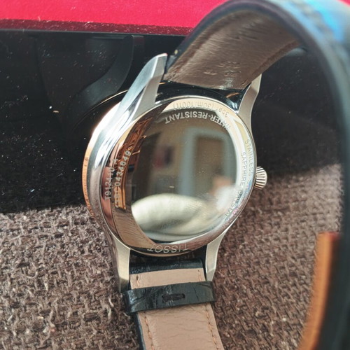 Tissot Classic Gent watch with 18k gold bezel, quartz, new