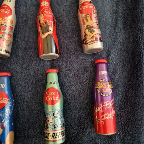 Coca-Cola collectible bottles like new, set of 8 with keychain gift