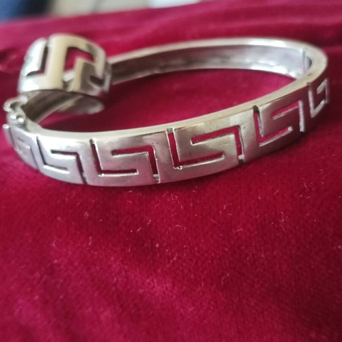Silver 925 bracelet and ring set like new with meander design