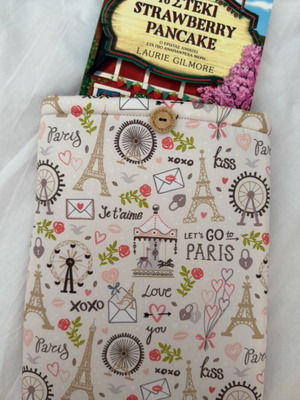 Handmade booksleeve with soft lining and button closure