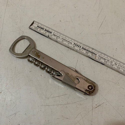 Vintage metal corkscrew bottle opener used