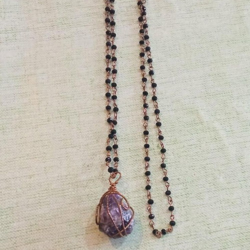 Pendant with amethyst wire-wrapped in copper and long rosary chain like new