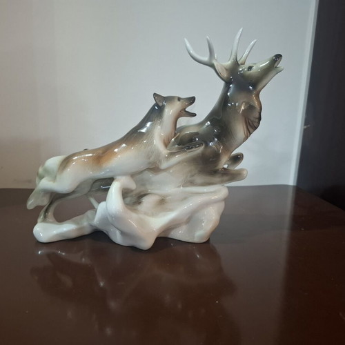 Royal Dux Bohemia porcelain figurine like new, deer and wolf scene