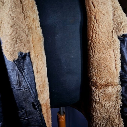 Men's mouton parka like new, black with beige fur lining