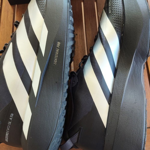 Adidas Evo SL ATR running shoes size 43.5, water-repellent, black with silver stripes