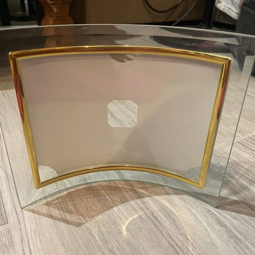 Glass curved photo frame used with gold trim