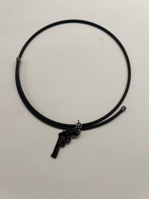 Necklace with small pistol pendant like new, black