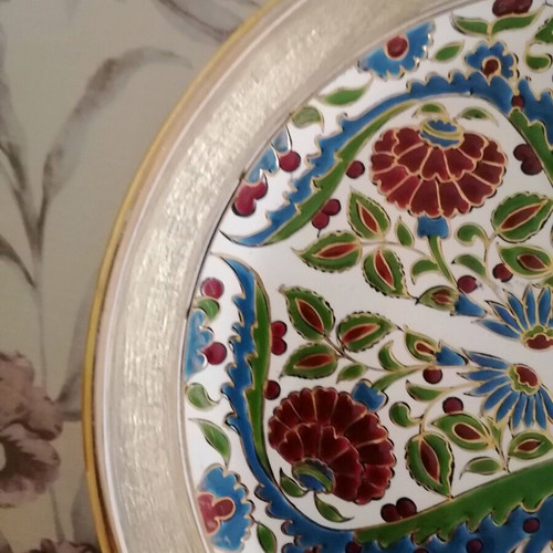 Ceramic wall plate used with gold details