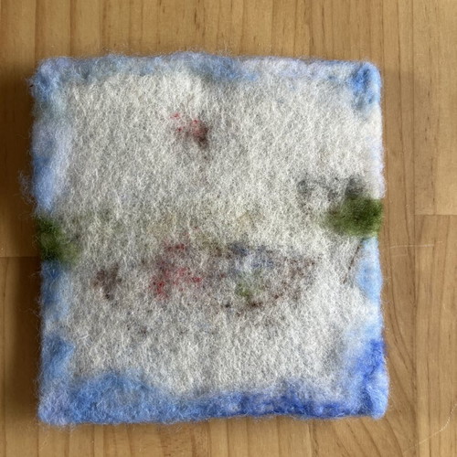 Handmade wool felt wall art with sailing boat and children