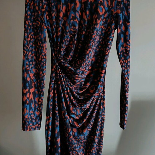 Midi dress like new with draped detail and animal print